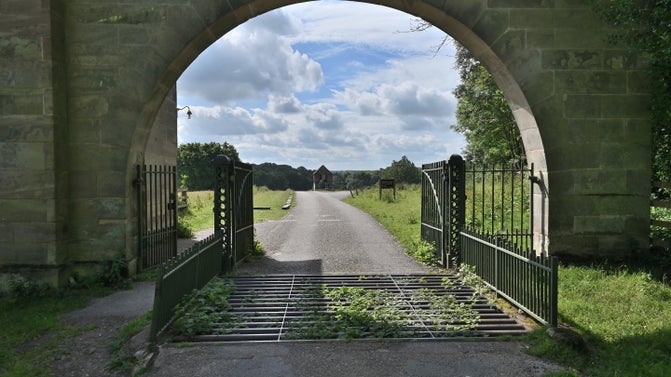 Looking through the archway of Middle Lodge at Calke Abbey, Derbyshire